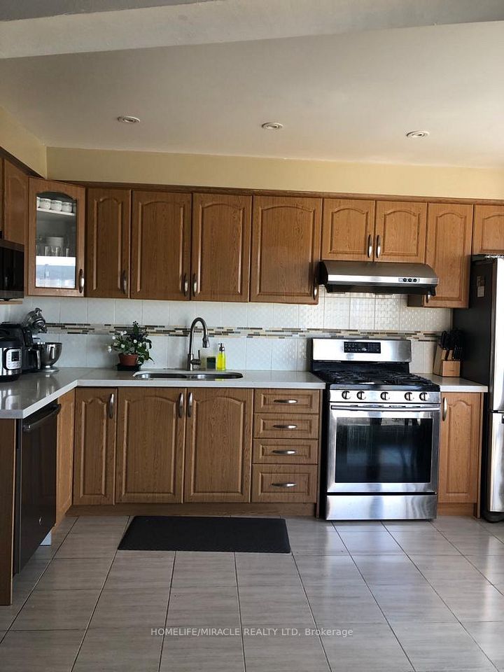 Att/Row/Townhouse at 144 Robbinstone Drive, Toronto E11, ON M1B 2E7, Toronto E11