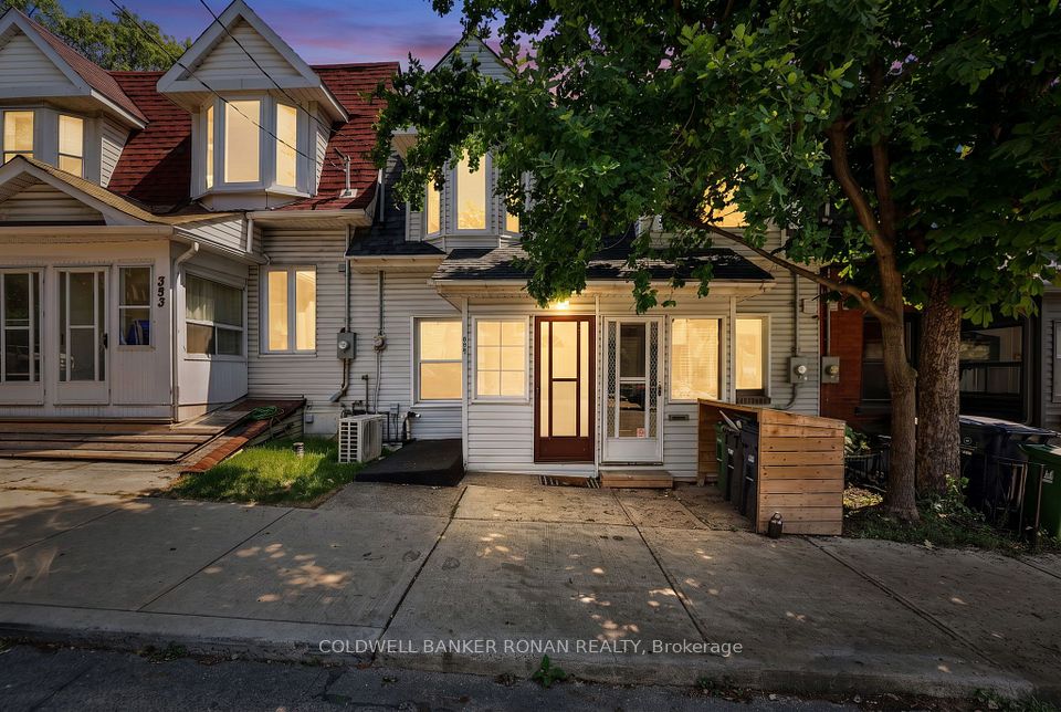 Att/Row/Townhouse at 391 Jones Avenue, Toronto, ON M4J 3G5, Toronto E01