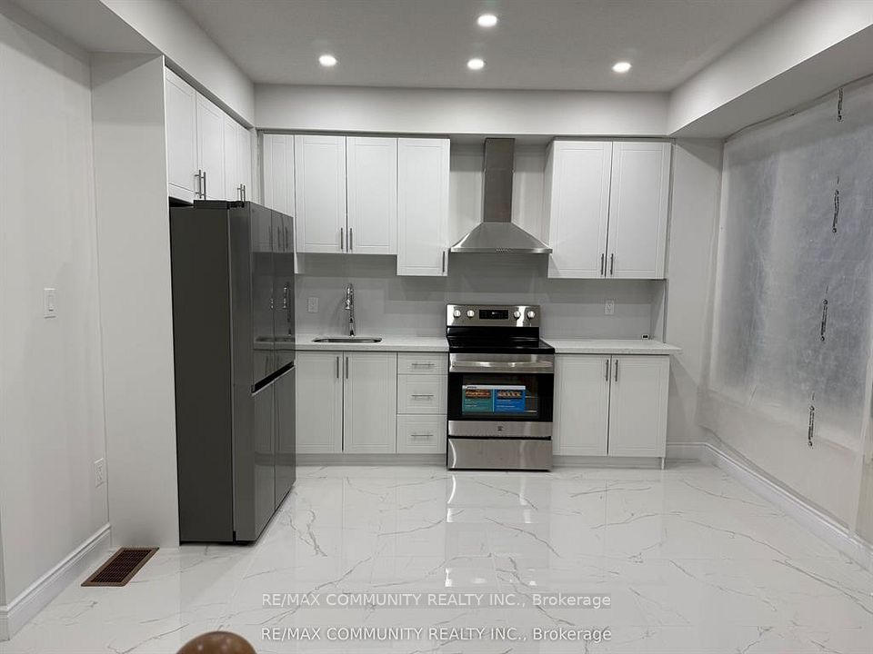 Att/Row/Townhouse at 387 Tennant Circle, Vaughan, ON L4H 5L2, Vaughan